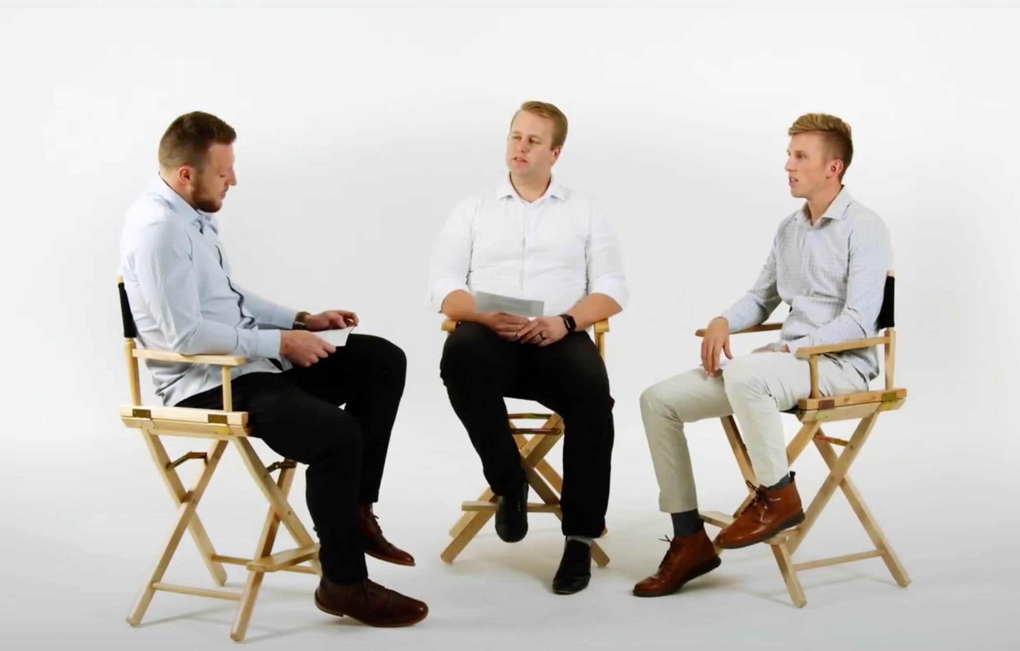 Truwear members interviewing Taysom Hill in director's chairs